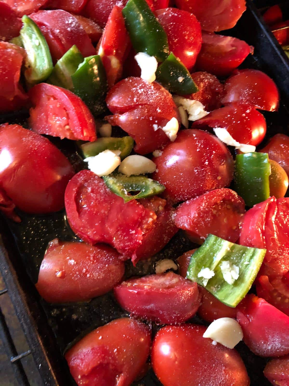 Tomatoes and vegetables to roast for sauce